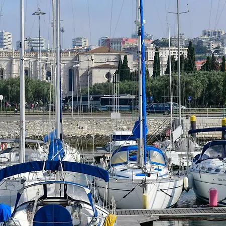 Yacht With View Of Historic Lissabon